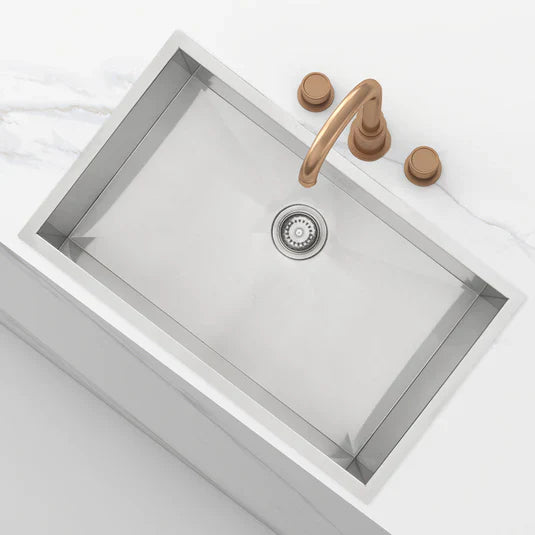 A sleek stainless steel kitchen sink showcasing a modern design, perfect for enhancing any culinary space.