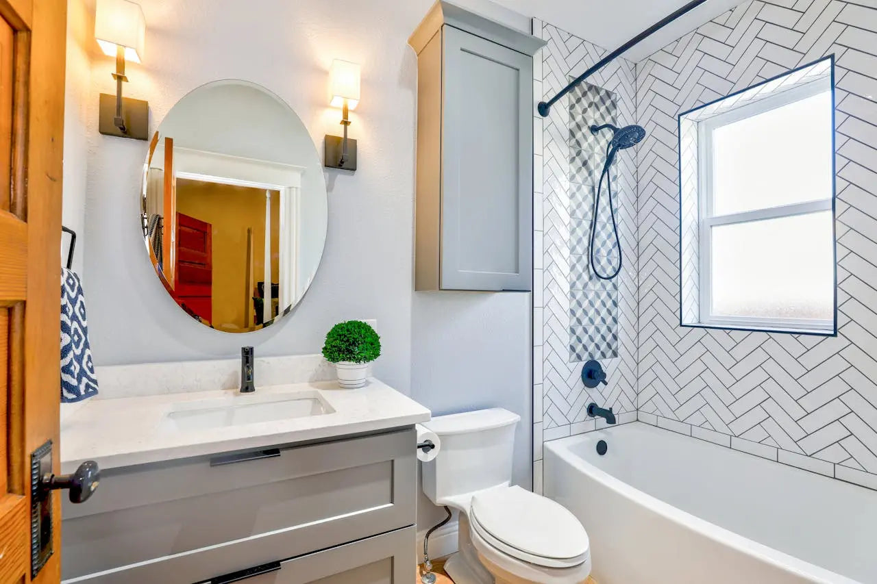  A clean and modern restroom featuring white toilets, ensuring hygiene and comfort for users in a public facility.