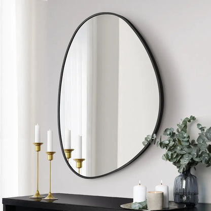 Tate irregular metal wall mirror in a modern living room