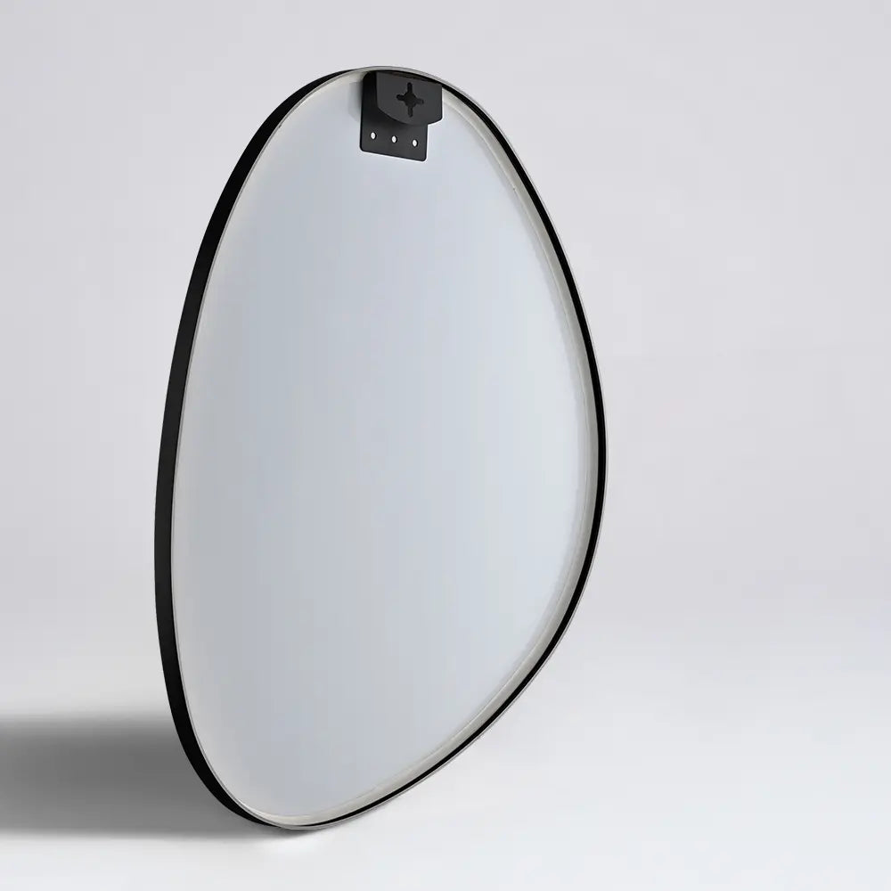 Decorative metal wall mirror with irregular shape back view