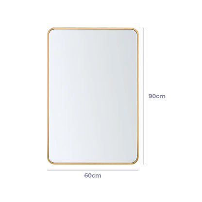 Tate rectangular mirror reflecting home decor accents