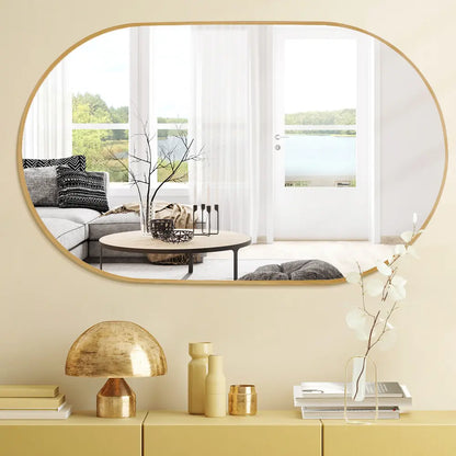 Oval vanity mirror with aluminium frame mounted on a tiled bathroom wall