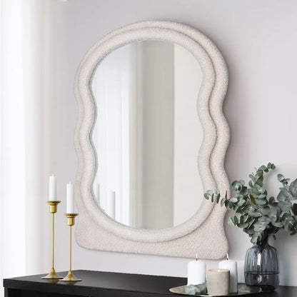 Verity boucle fabric wall mirror in a modern living room