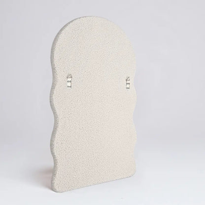 Soft-textured boucle wall mirror frame back view