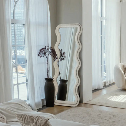 Milos wavy full-length mirror in a modern bedroom