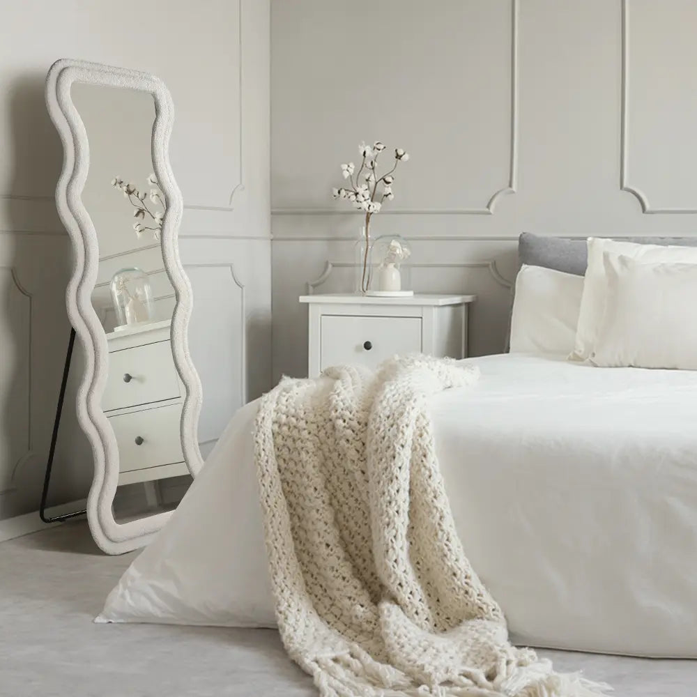 Milos wavy full-length mirror in a modern bedroom set up