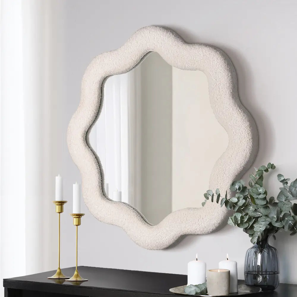 Ebba wavy fabric wall mirror in a modern living room