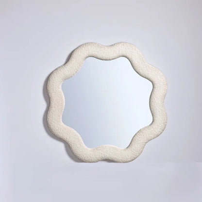 Unique wavy wall mirror with soft fabric detail