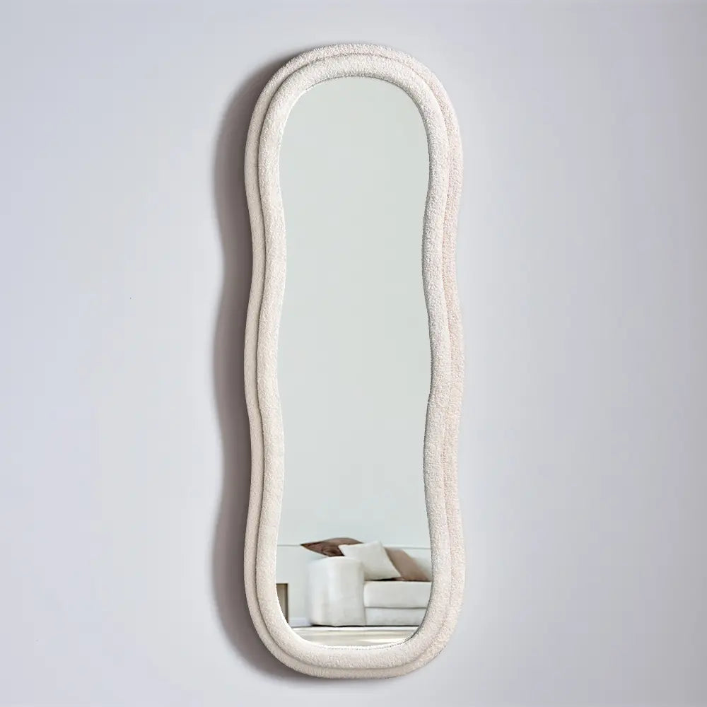 Stylish fabric-framed full-length mirror close-up