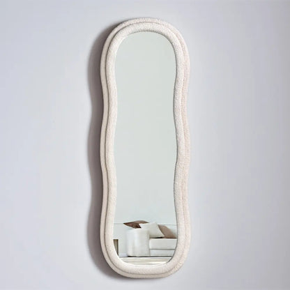 Stylish fabric-framed full-length mirror close-up