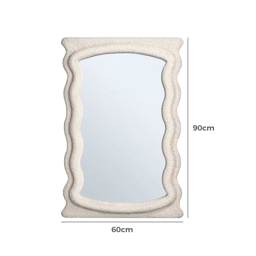 Modern Saige fabric wall mirror in a stylish space