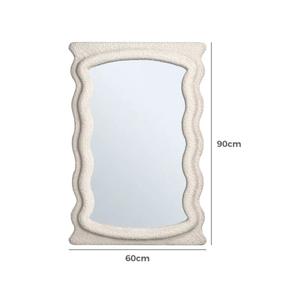 Modern Saige fabric wall mirror in a stylish space