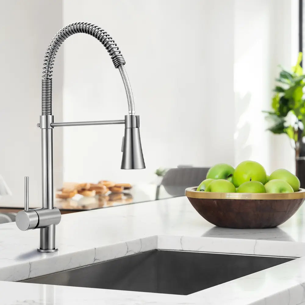 Stainless steel Vivi pull down mixer tap in action