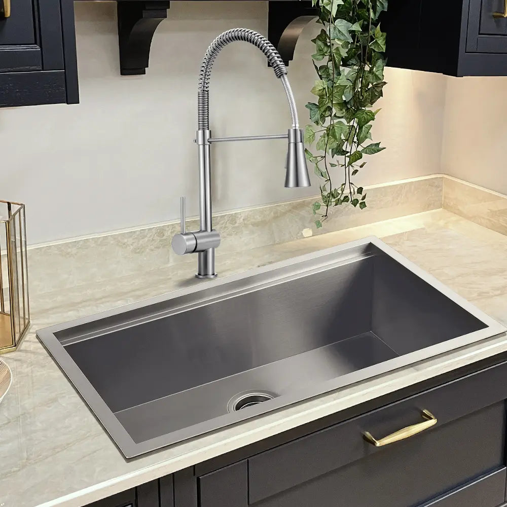 Vivi pull-down faucet with sleek spring design in silver