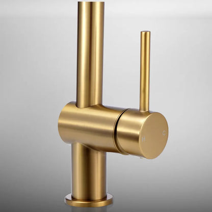 Side view of Vivi pull down sink mixer tap in a modern setup in gold