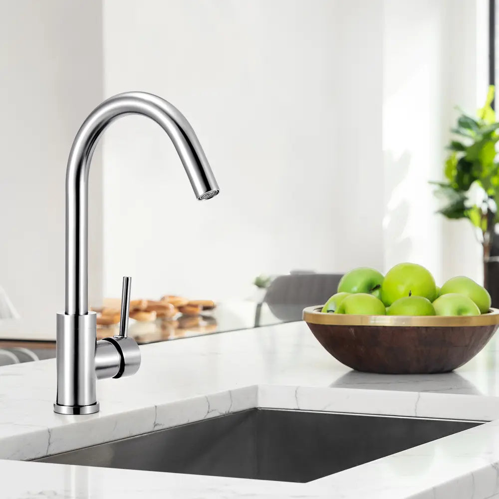 High-arched Jeni Gooseneck Mixer Tap installed over a double sink in silver