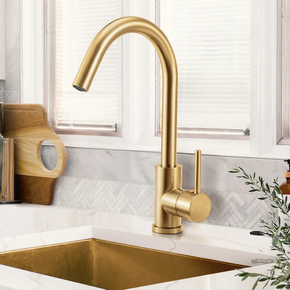 Jeni Gooseneck Mixer Tap installed in modern kitchen in gold