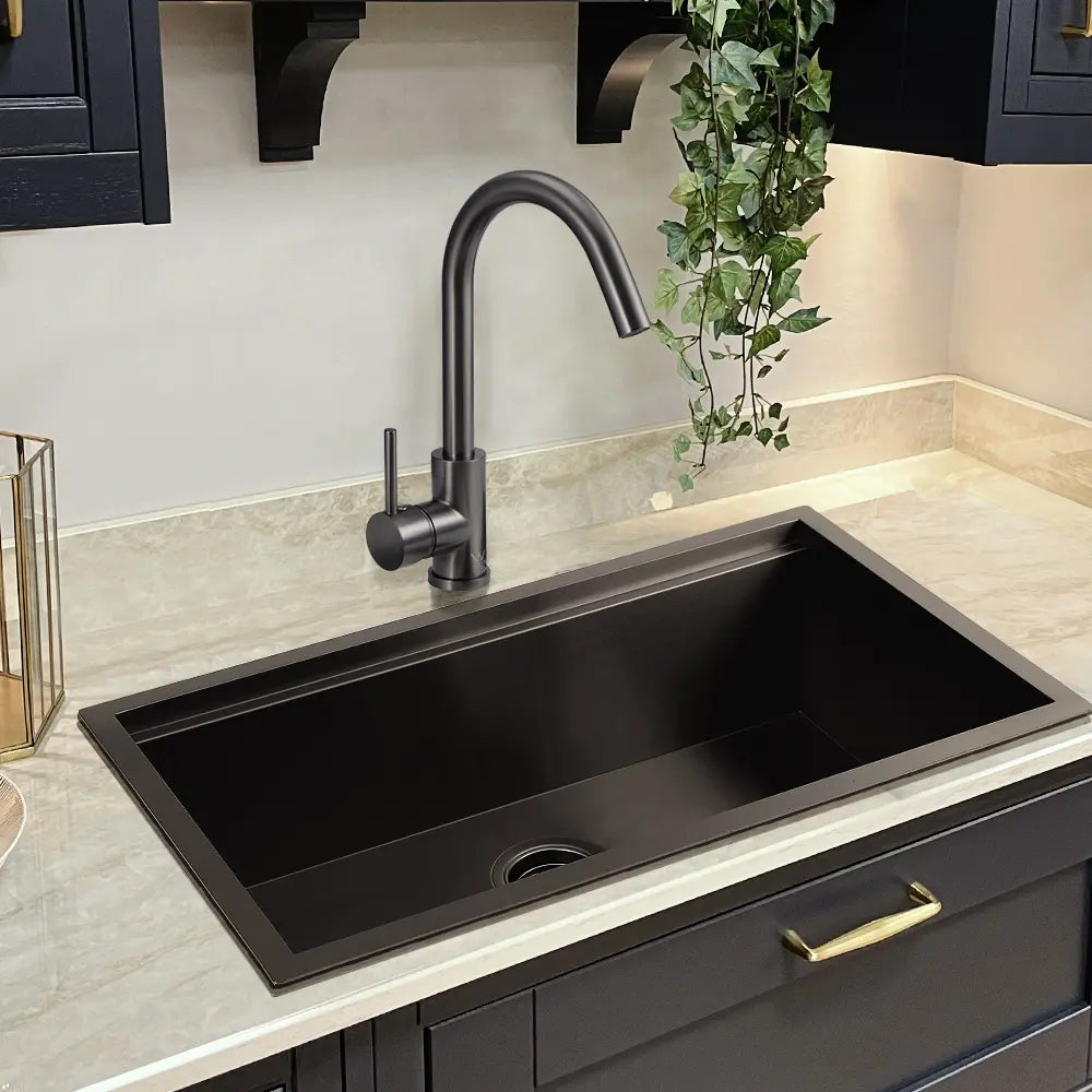 Jeni Slimline Gooseneck Tap paired with deep kitchen sink in chrome