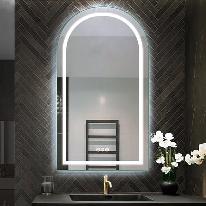 Frontlit frameless arch mirror glowing in a contemporary bathroom