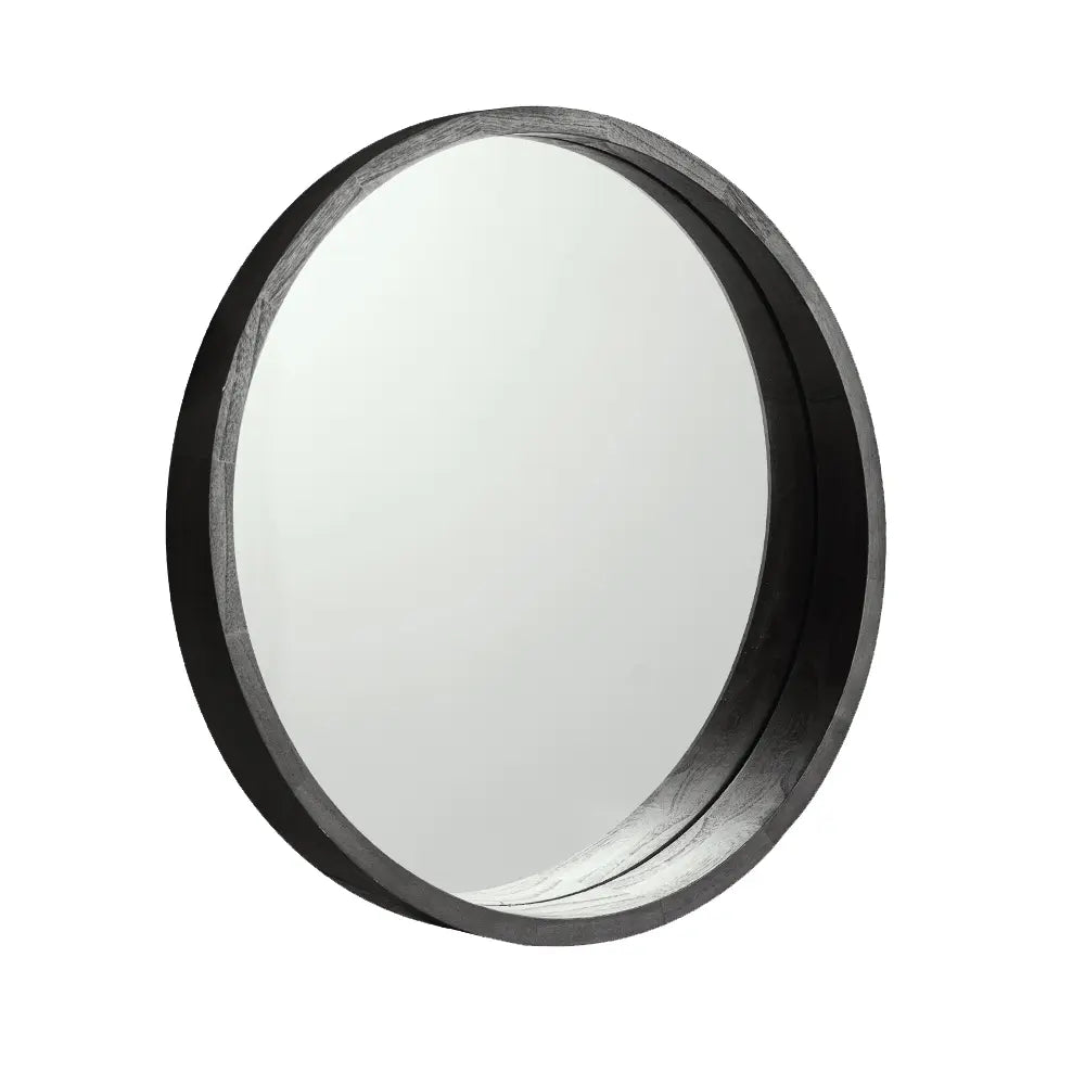 Close-up of Libra Round Wall Mirror's solid wood frame in black