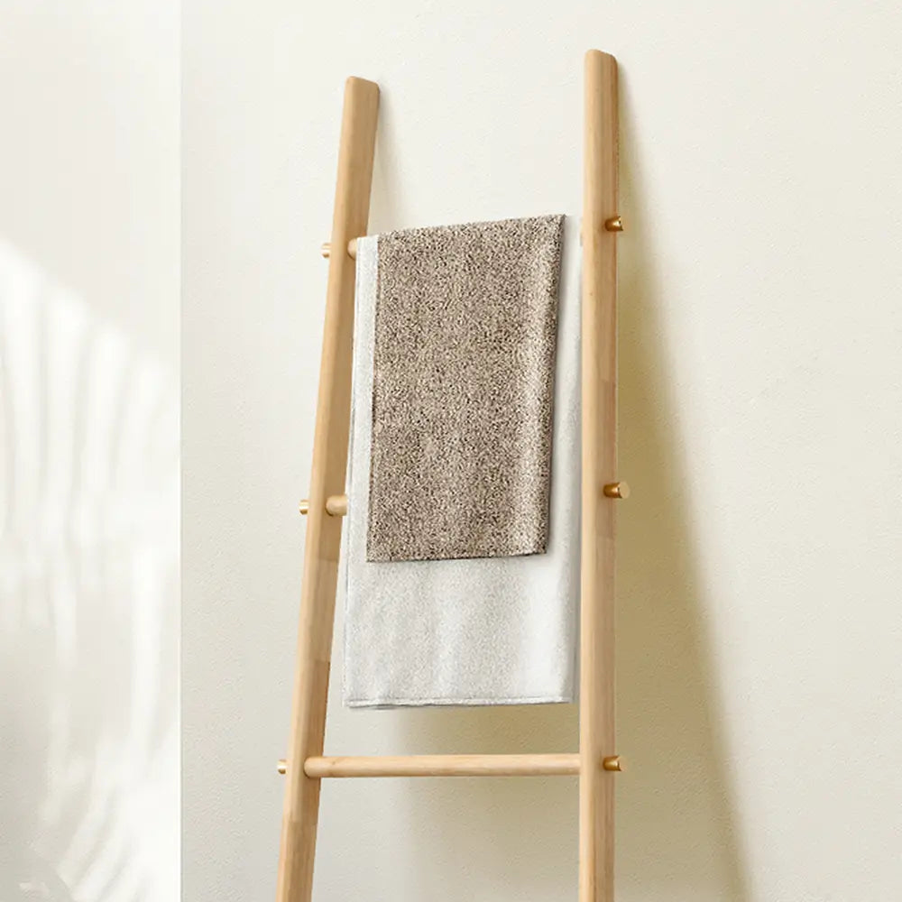 Freestanding Seth Towel Ladder with multiple towels hung