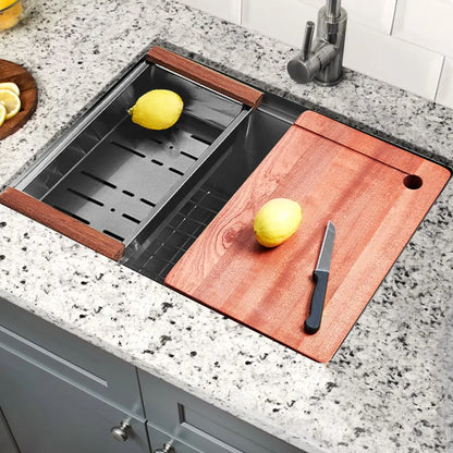 Close-up of Sima-X single bowl sink with cutting board and lemon