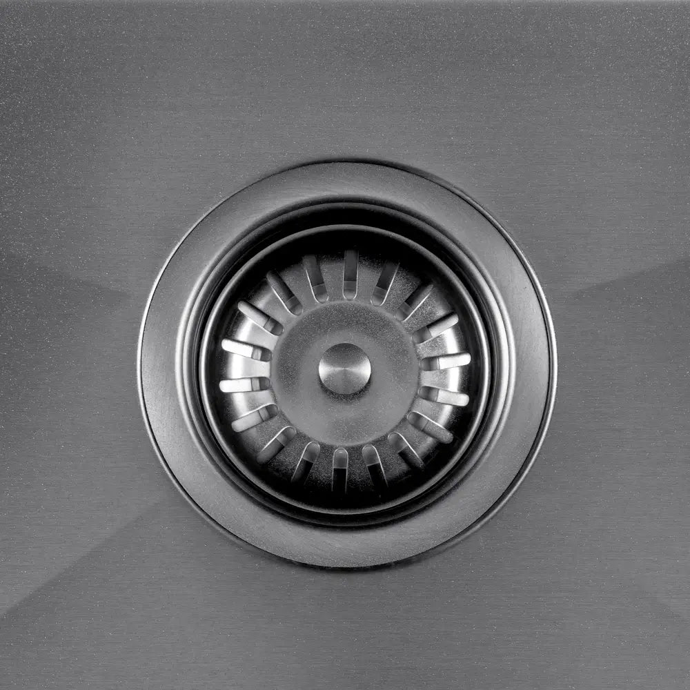 Close-up of Sima-X single bowl sink strainer in chrome