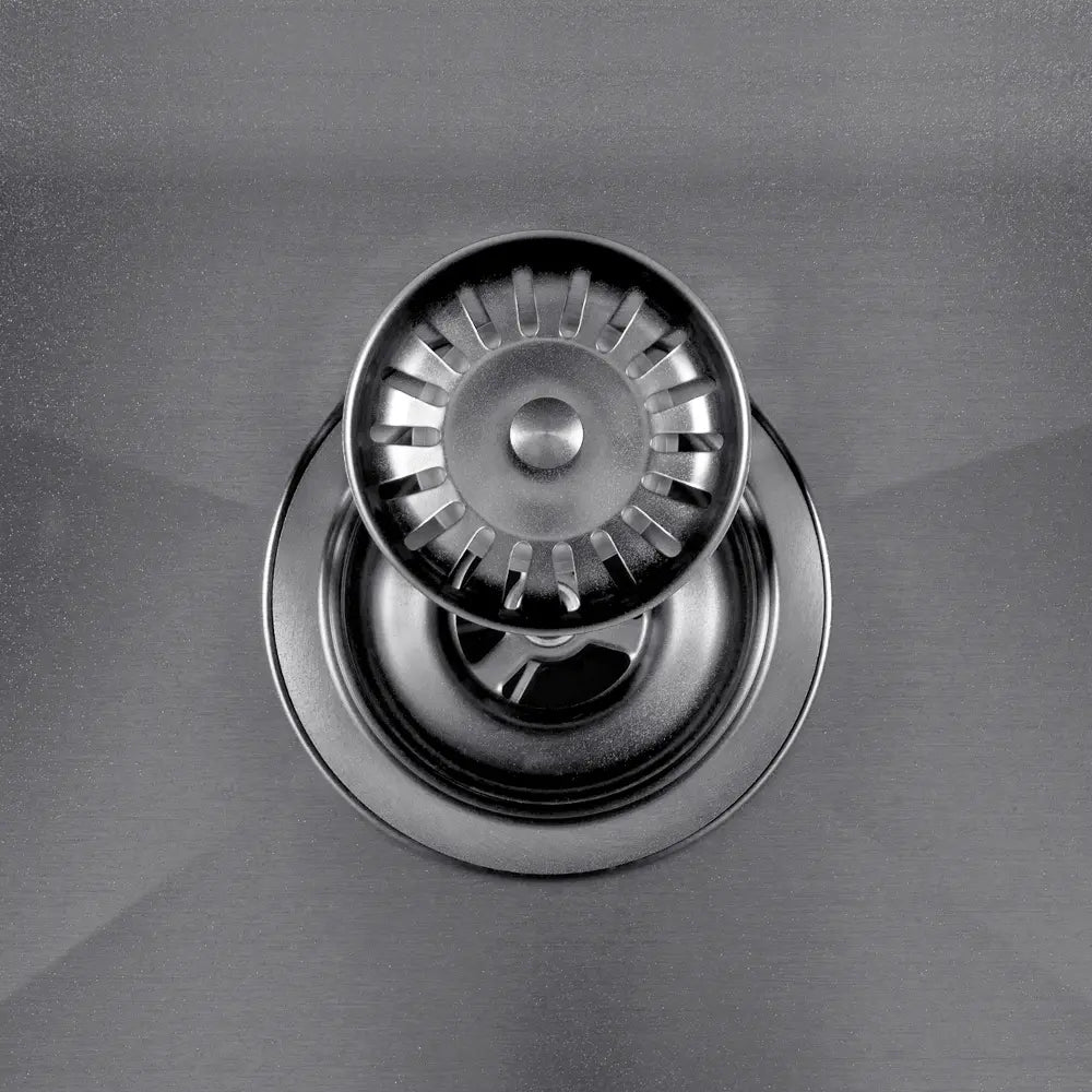 Close-up of Sima-X single bowl sink strainer in silver