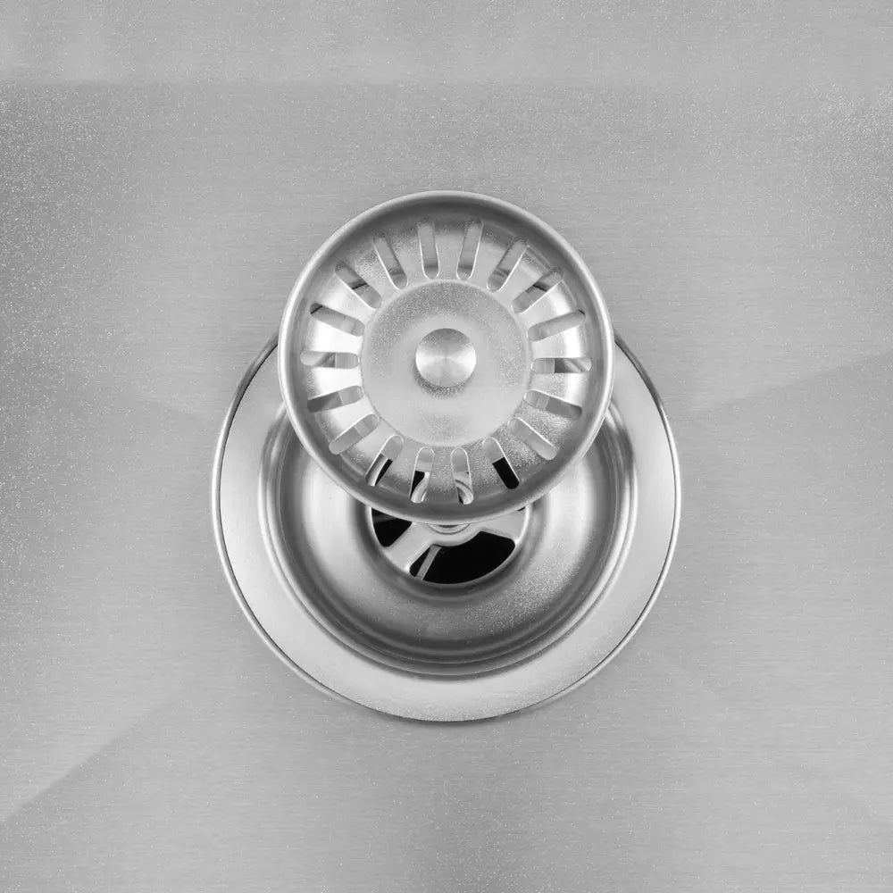 Close-up of Sima-X single bowl sink in silver strainer