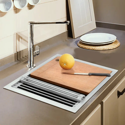 Overhead view of Sima-Plus sink showing cutting board in silver color