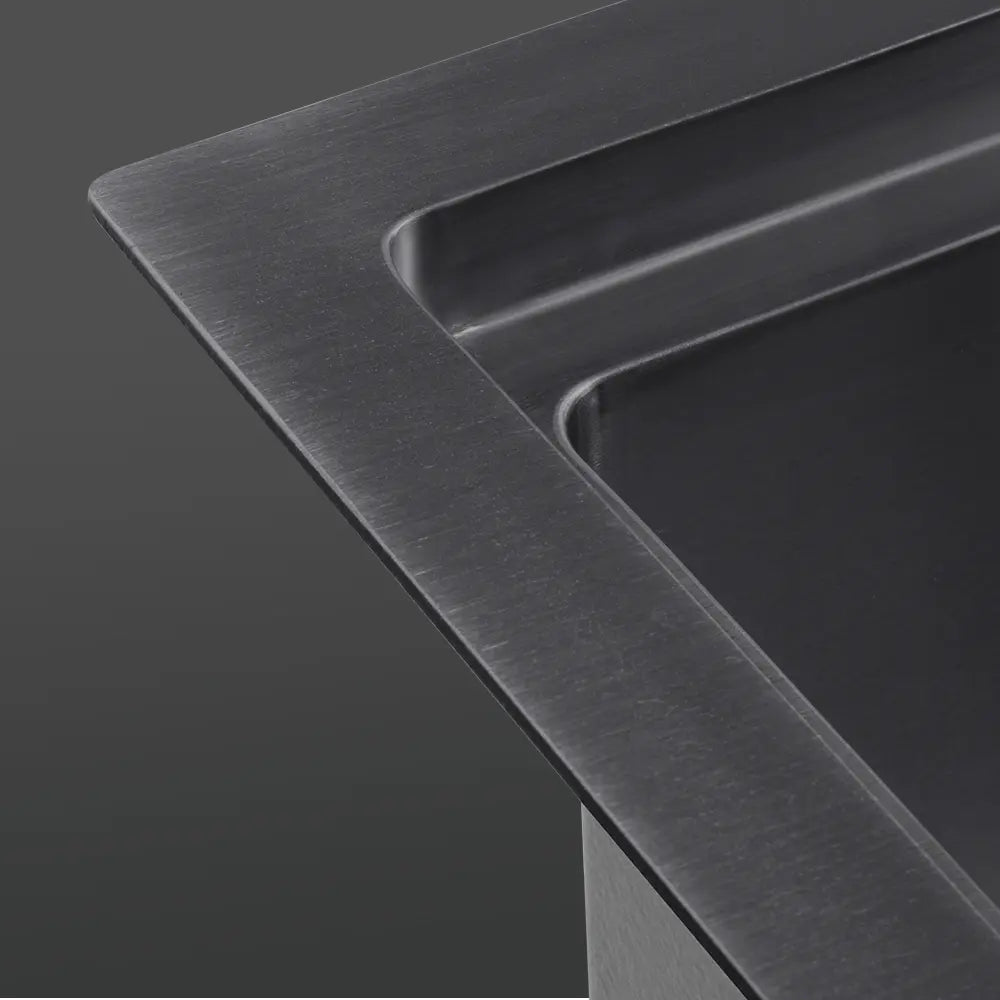 Close-up of Sima-Plus sink's durable stainless steel finish